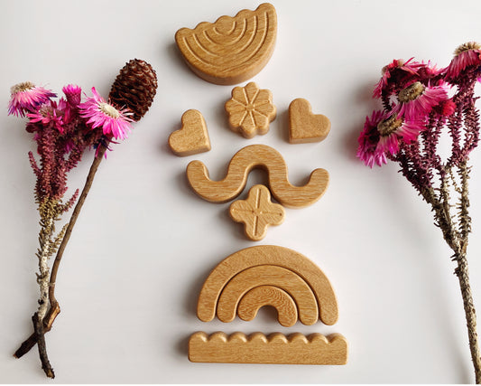 Nature on a balance. Ethically made, heirloom-quality wooden blocks to invite little hands (and big hands too!) to practice their fine motor skills and discover the concepts of balance, symmetry and collaboration. This is a limited collection made entirely of local Tembusu wood. Reminiscent of summer blooms, the blocks can also be used for imaginative small-world play.