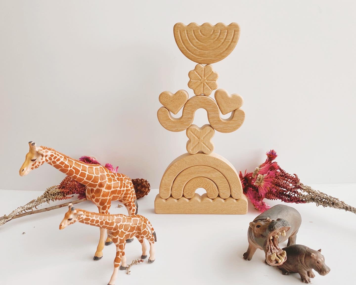 Nature on a balance. Ethically made, heirloom-quality wooden blocks to invite little hands (and big hands too!) to practice their fine motor skills and discover the concepts of balance, symmetry and collaboration. This is a limited collection made entirely of local Tembusu wood. Reminiscent of summer blooms, the blocks can also be used for imaginative small-world play.